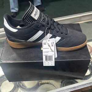 Adidas Black and White Sneakers with Iconic Stripes